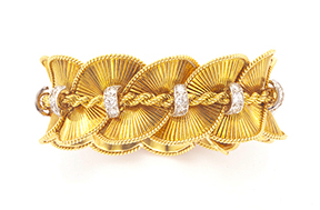 Cartier gold and dia swirl 1950's bracelet