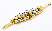Cartier, Paris gold balls w lapis tips bracelet